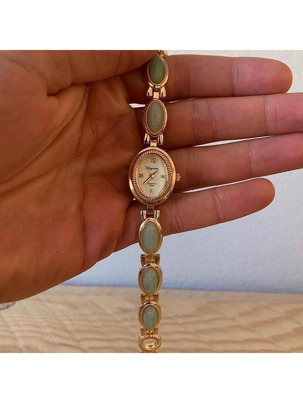 Dainty Gold watch with light blue jade stone opal accents. Item works tell time - Picture 2 of 8